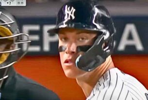 Aaron Judge at the crease, focused on the pitch - a key moment in the baseball game