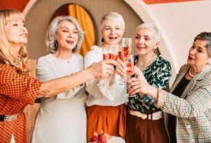 Group of elderly women raising a toast, celebrating the beauty of longevity.