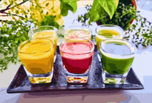 Variety of Immunity Shots in glasses on a tray, showcasing diverse preparations for 'Immunity Shots