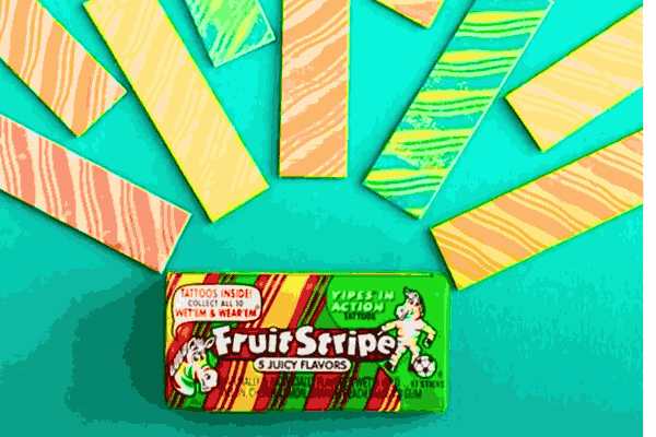 A colorful pack of Fruit Stripes gum, the cherished delight with whimsical zebra mascot Yipes, symbolizing the end of a sweet era