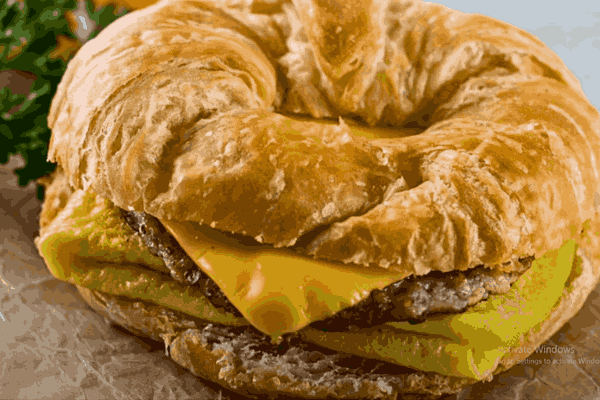 Delicious Burger King Breakfast - Enjoy a 1-cent Croissan'wich and exclusive Royal Perks bonuses on National Croissant Day.