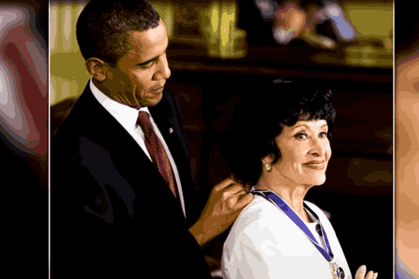 Chita Rivera proudly receiving the Presidential Medal of Freedom from President Obama, a symbol of her remarkable contributions.