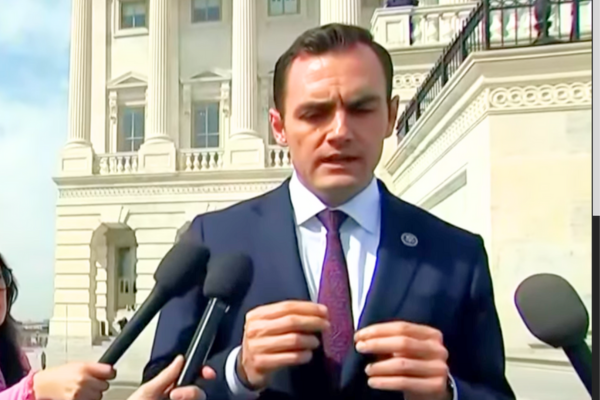 Rep. Mike Gallagher (R-Wis.) surrounded by press discussing TikTok ban