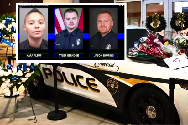 Law enforcement officers mourning the deaths in an Oklahoma shooting incident