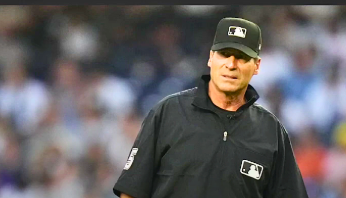 Angel Hernandez officiating a Major League Baseball game, marking his retirement after over three decades in the sport.