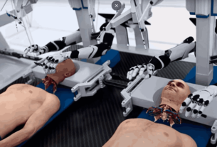 BrainBridge's advanced robotic system performing a simulated head transplant surgery.