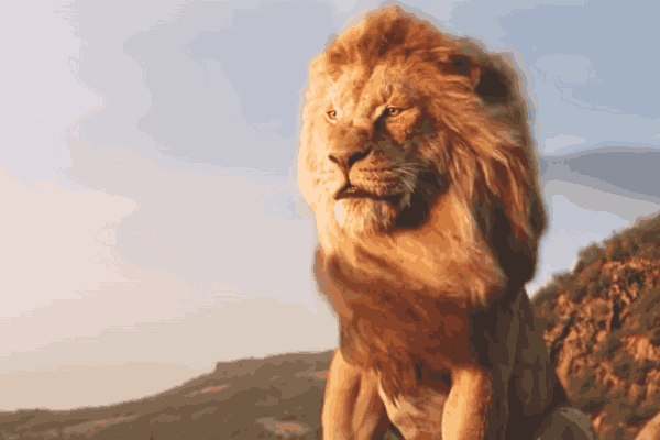 A majestic lion stands proudly overlooking the Pride Lands, embodying the spirit of Mufasa in Disney's prequel.