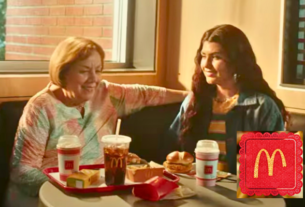 A heartwarming scene of a grandmother and granddaughter sitting at a table filled with McDonald's treats, including the Grandma McFlurry.