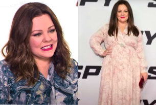 Melissa McCarthy smiling confidently, showcasing her weight loss transformation.