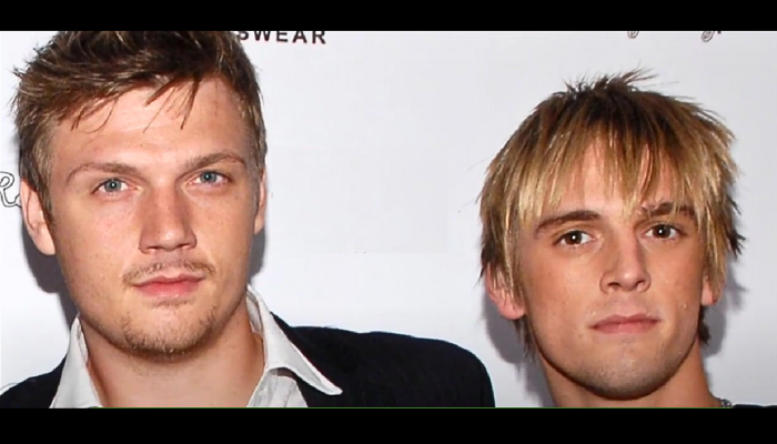 Nick and Aaron Carter stand side by side on a promotional poster for the Fallen Idols docuseries.