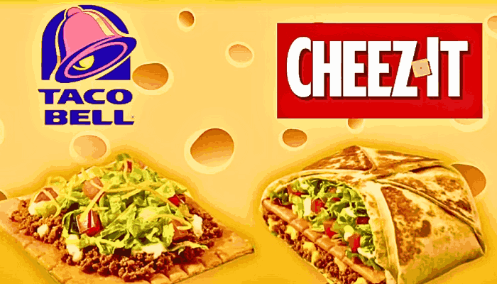 A close-up of Taco Bell's Big Cheez-It Tostada, featuring a large Cheez-It cracker topped with seasoned beef, tomatoes, lettuce, cheddar cheese, and sour cream.