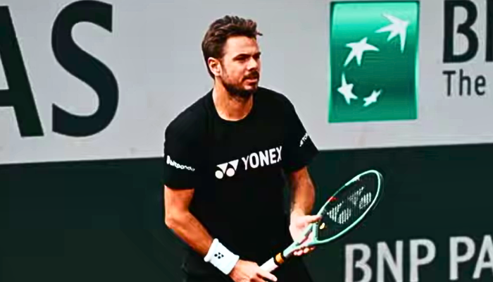 Stan Wawrinka celebrates his victory over Andy Murray at the French Open, highlighting his exceptional skill and tactical brilliance.