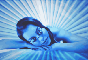 Person using a sunbed, highlighting the risks of intense UV radiation exposure.