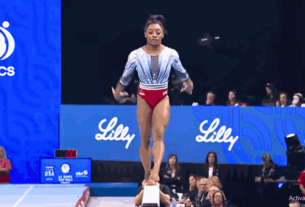 Simone Biles performing on the balance beam at the US Gymnastics Olympic Trials.