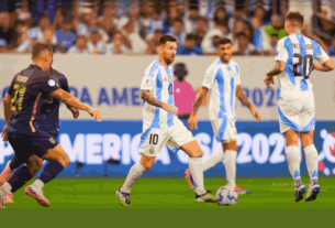 Players from Argentina and Ecuador in action during the Copa América quarterfinal match.