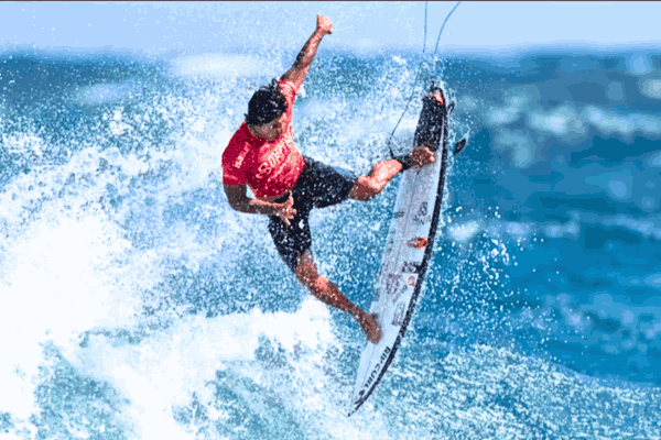 Gabriel Medina performing a stunning barrel ride at Teahupo'o during the 2024 Olympics, earning a remarkable 9.90 score.