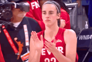 Caitlin Clark dominating on the court during the Fever vs Sky game, leading Indiana to a 100-81 victory.