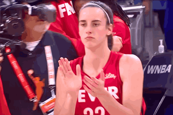Caitlin Clark dominating on the court during the Fever vs Sky game, leading Indiana to a 100-81 victory.