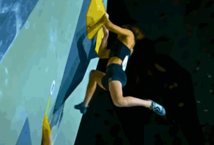 Climbers competing in Olympic Sport Climbing at the Paris 2024 Olympics, showcasing the bouldering, lead, and speed disciplines.