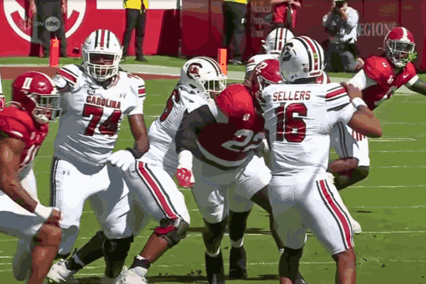 Alabama vs South Carolina football game featuring a last-second interception that secured Alabama's 27-25 victory in a thrilling SEC matchup.