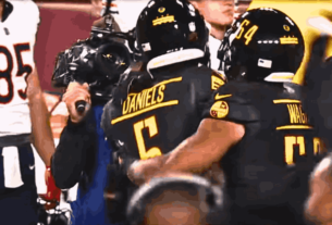 Commanders’ quarterback completes Hail Mary Play for a last-second 52-yard touchdown, securing victory over the Bears.