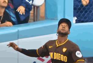Profar leaping to make a crucial catch in Game 2 of the NLDS, securing the Padres' lead over the Dodgers.