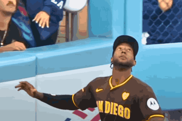 Profar leaping to make a crucial catch in Game 2 of the NLDS, securing the Padres' lead over the Dodgers.
