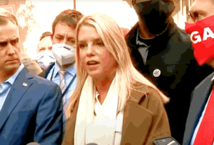 Pam Bondi speaking at a press conference, showcasing her expertise as Trump’s nominee for Attorney General and former Florida Attorney General.