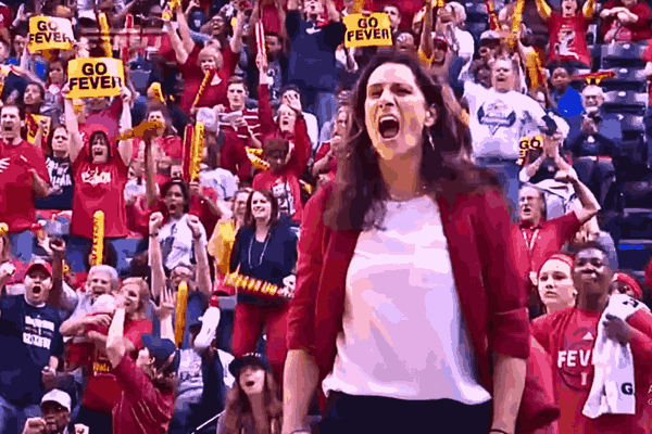 Stephanie White, head coach of the Indiana Fever, guiding players on the court during her return to lead the team.