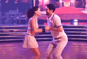 Joey Graziadei and Jenna Johnson celebrate their historic win at the DWTS Finale, holding the Len Goodman Mirrorball Trophy on the dazzling stage.